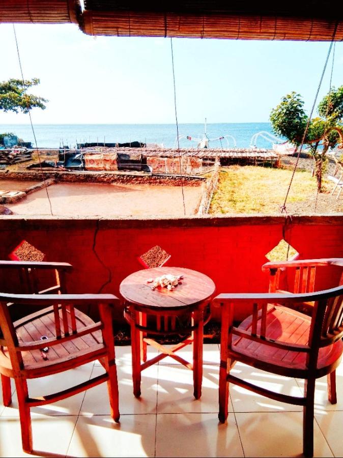 Pelangi Beach Homestay Амед Номер фото