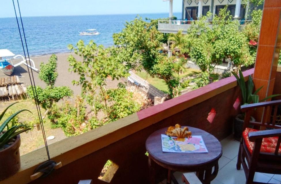 Pelangi Beach Homestay Амед Номер фото